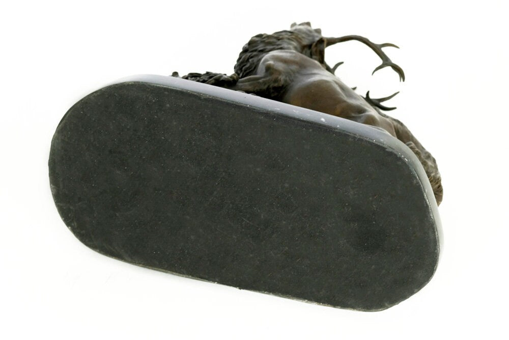 Bottom view of a detailed bronze sculpture featuring hounds and a deer, showcasing the marble base.