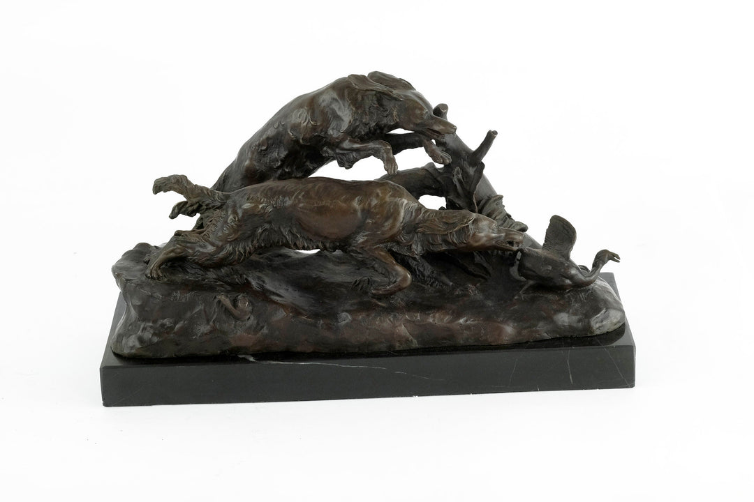 Bronze sculpture of hunting hounds chasing a duck, detailed artwork by Pierre-Jules Mène, mounted on marble.