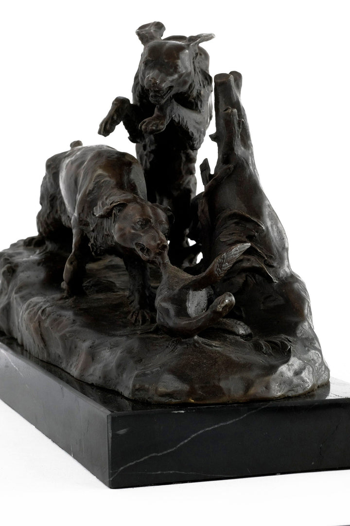 Bronze sculpture of hunting hounds chasing a duck, mounted on a dark marble base, by sculptor Pierre-Jules Mène.