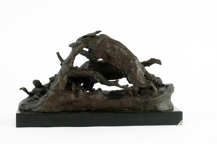 Bronze sculpture of hunting hounds chasing a duck on a dark marble base, crafted by Pierre-Jules Mène.