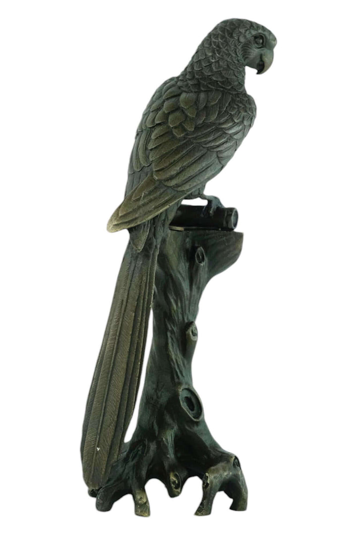 Bronze macaw sculpture on a tree trunk, detailed design with warm patina, 18 cm tall, signed by artist Nick.