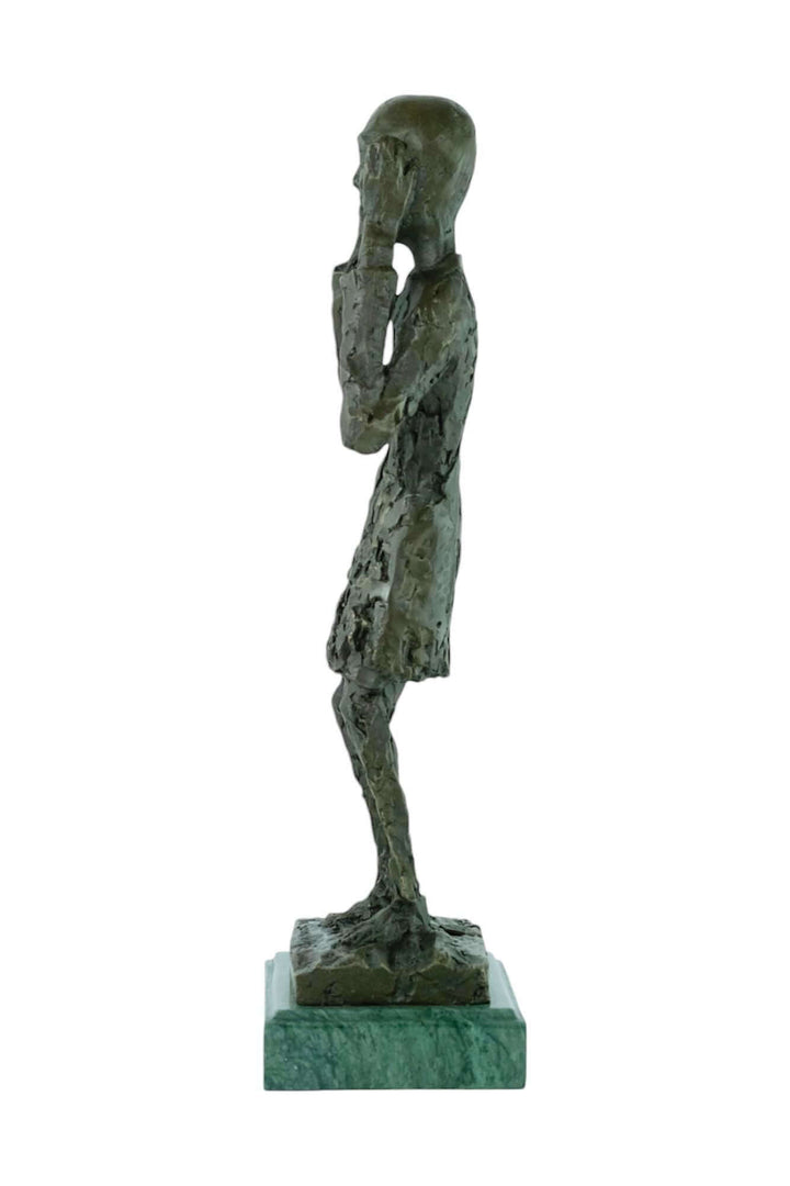 Bronze sculpture of The Scream by Edvard Munch, modern art piece showcasing emotional depth and expression.