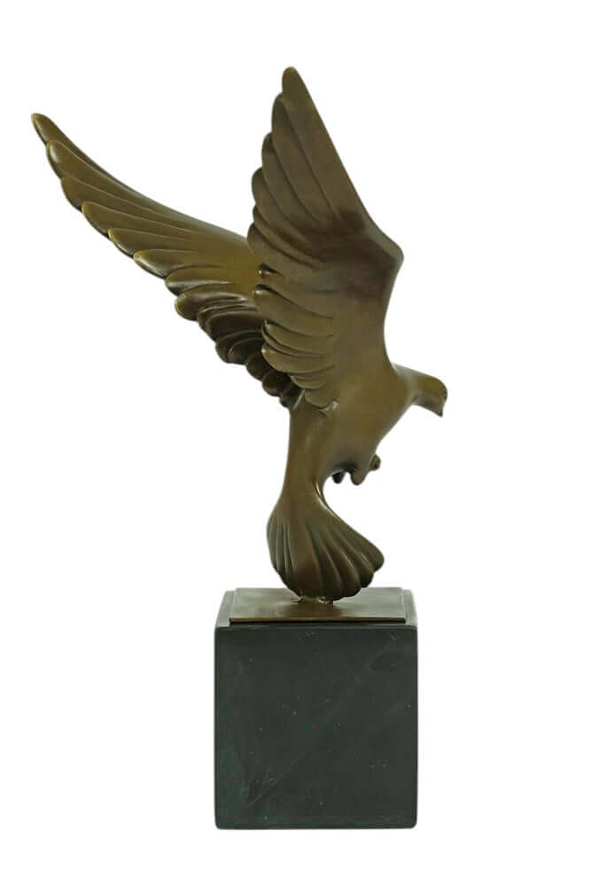 Bronze sculpture of a descending pigeon on marble base, showcasing detailed wings and warm patina.