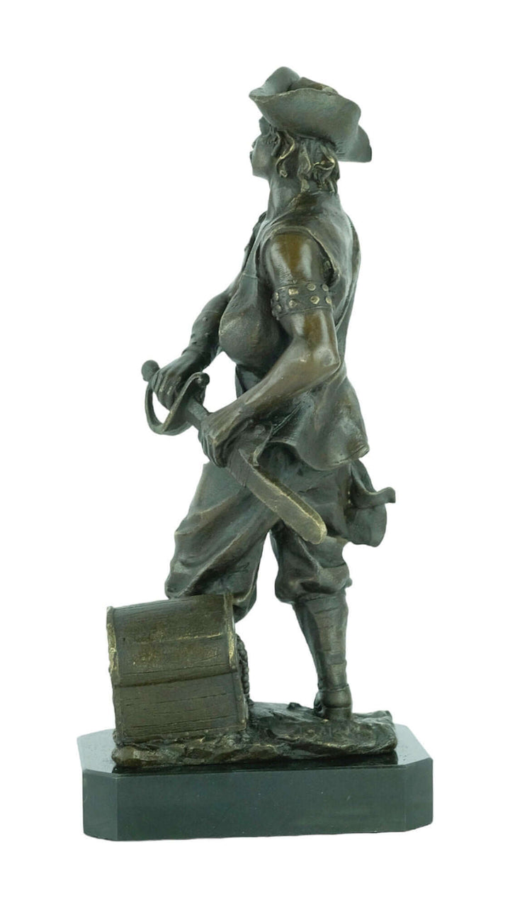 Bronze sculpture of a pirate holding a sword and treasure chest, detailed art piece on a marble base.