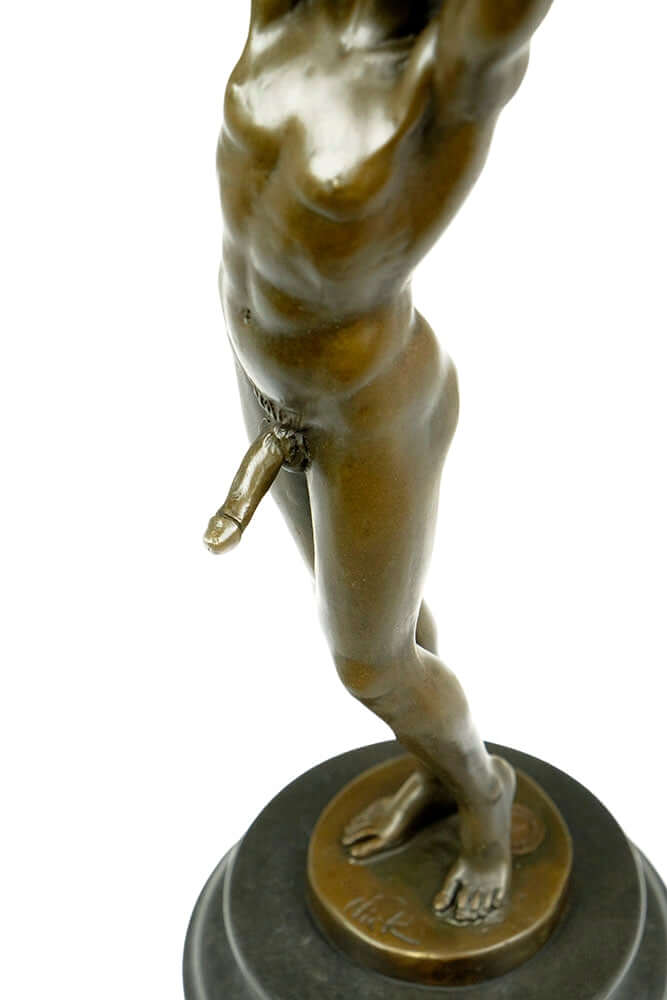 Bronze sculpture of a male nude in a sensual pose, mounted on a round marble base, 32 cm tall.