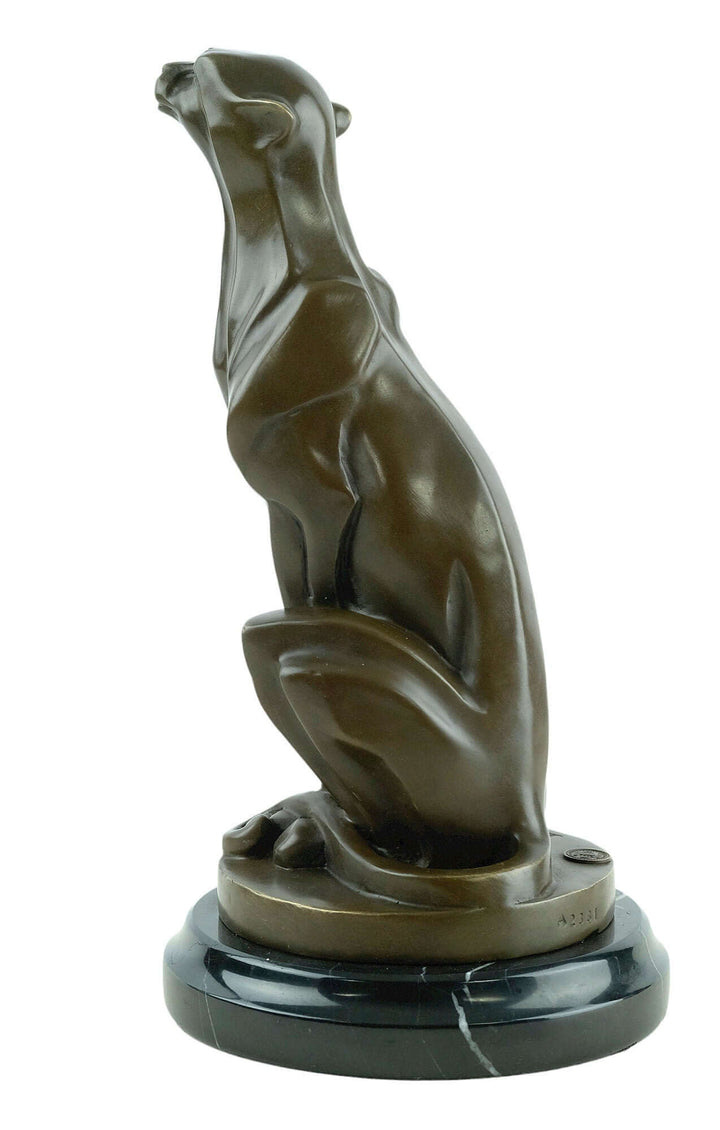 Bronze sculpture of a sitting cheetah in Art Deco style, mounted on a marble base, signed by Michel Decoux.
