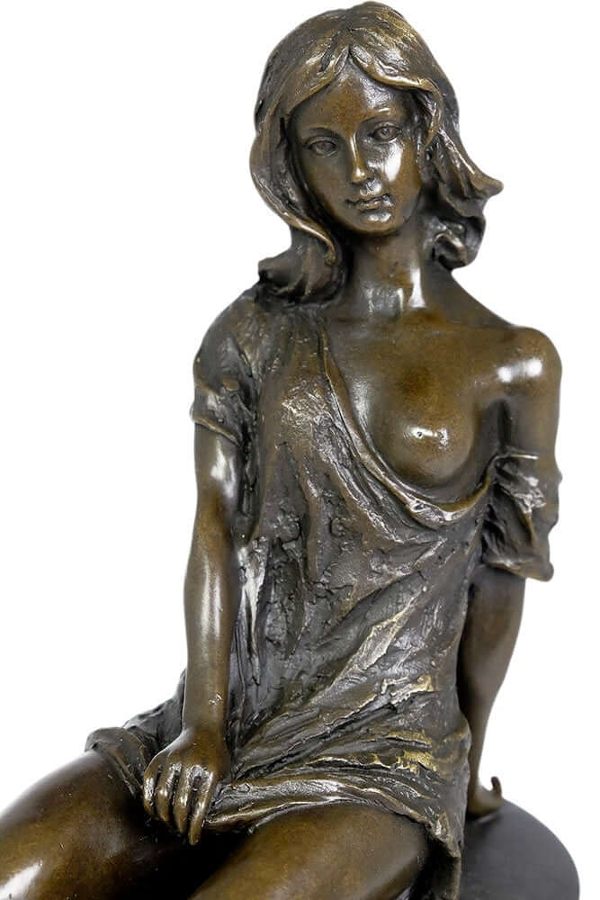 Bronze sculpture of a young female in a flimsy dress, showcasing fine details and light erotic display.
