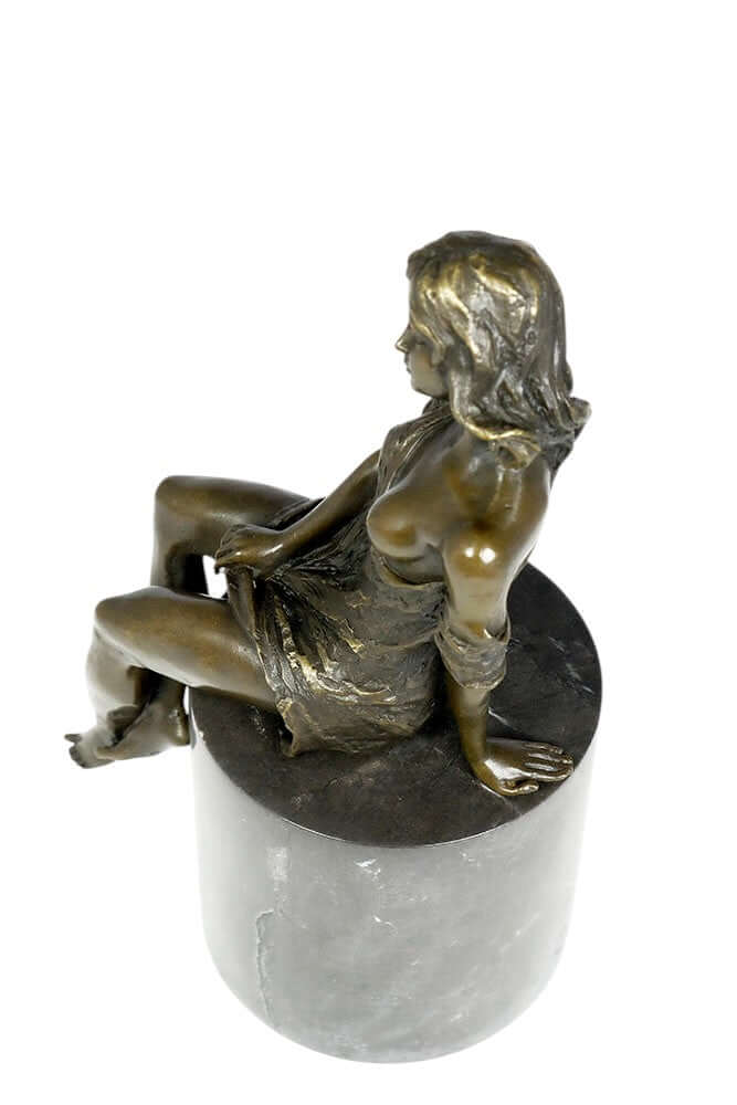 Bronze sculpture of a sitting female in a flimsy dress, mounted on a round marble base, detailed and decorative.