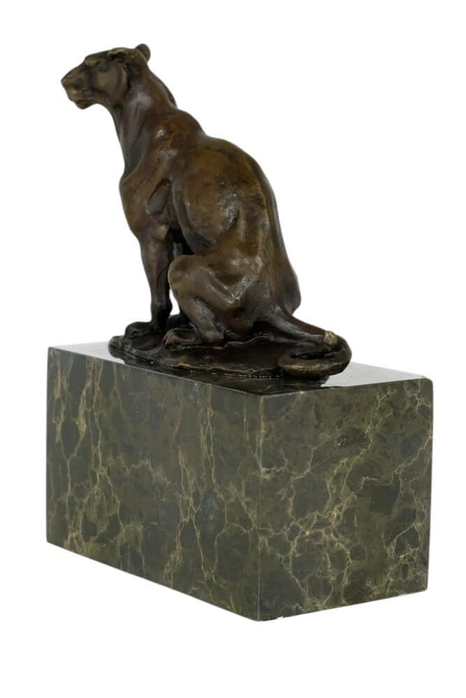 Bronze sculpture of a sitting panther by Louis-Albert Carvin on a marble base, showcasing realistic details.