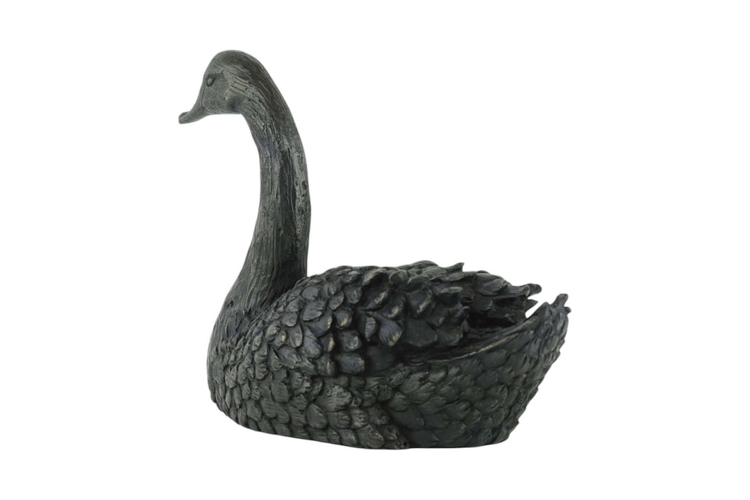 Bronze sculpture of a swimming swan, detailed design, brown patina, suitable for indoor and outdoor display.