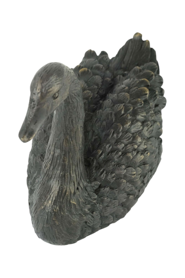 Elegant bronze sculpture of a swimming swan, detailed with a rich brown patina, perfect for decor.