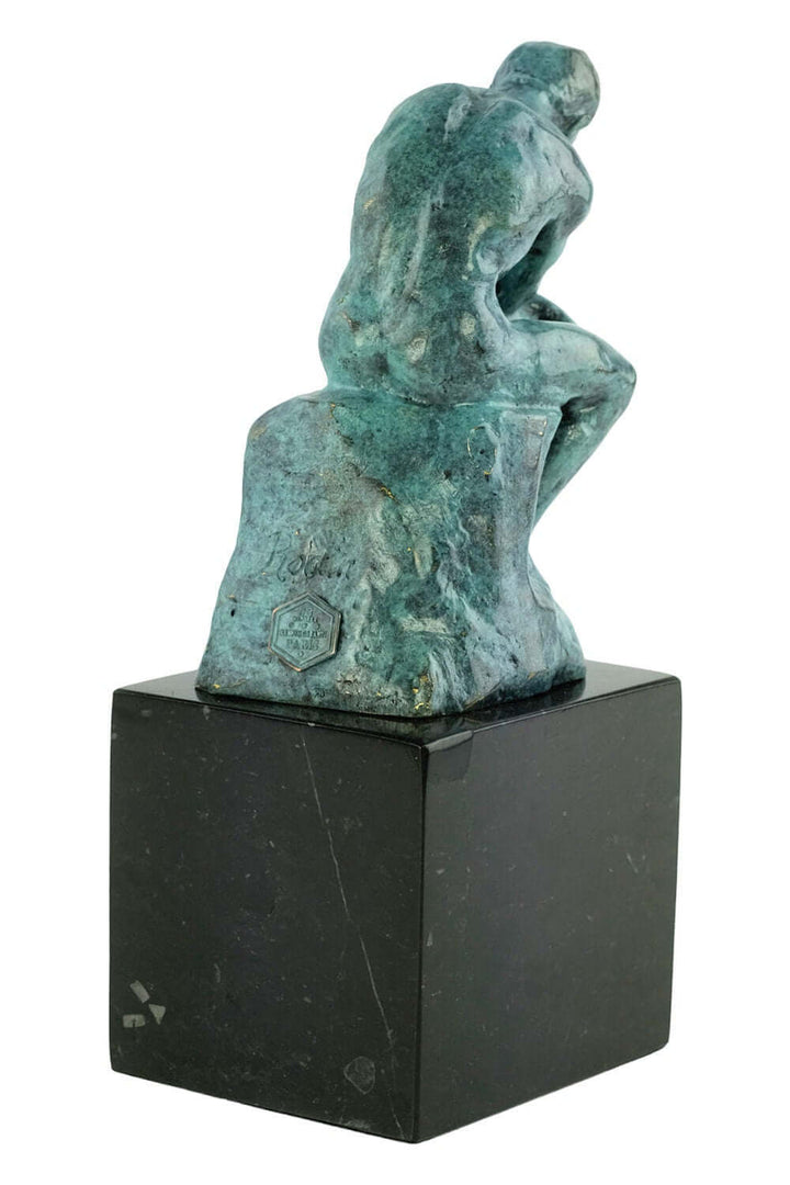 Bronze Thinker sculpture in green patina on black marble base, classic Rodin art piece, height 20 cm.