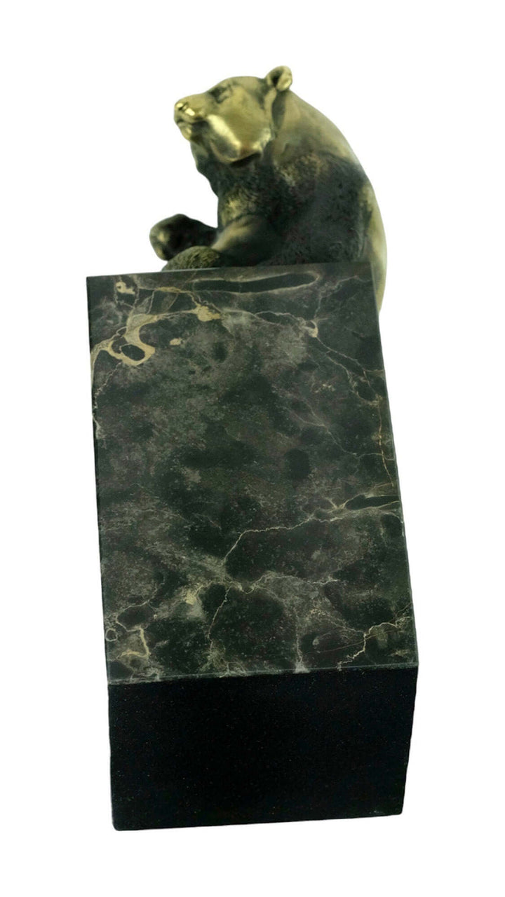 Bronze sculpture of a waving panda on a dark flamed marble base, showcasing fine craftsmanship and detail.