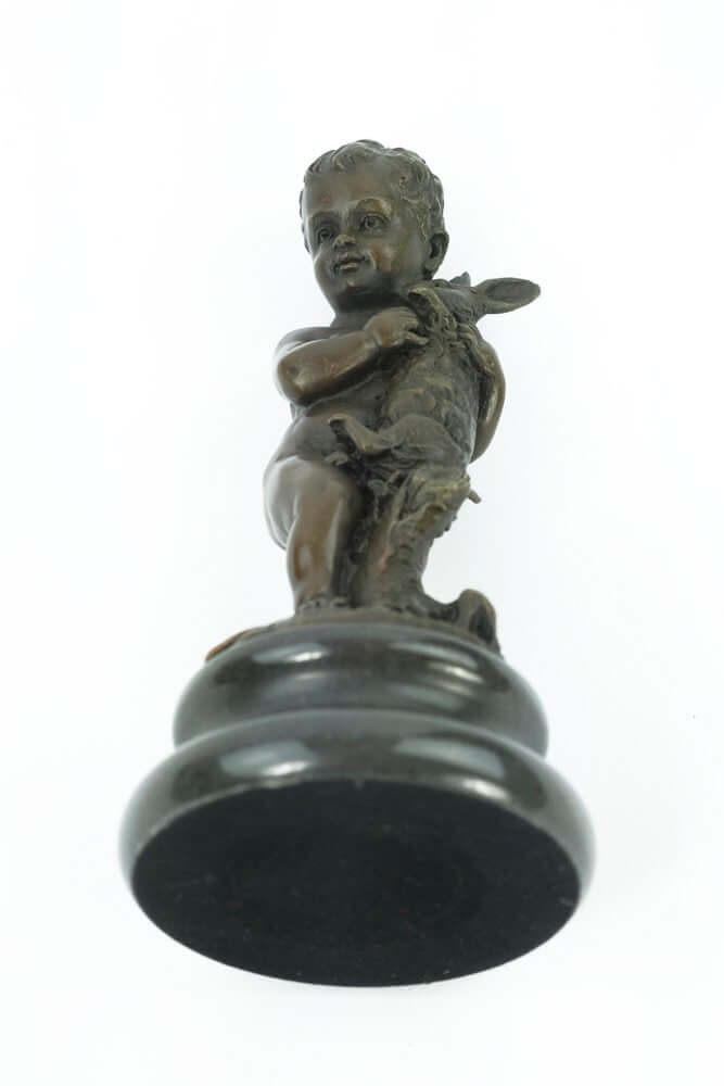 Bronze sculpture of a young boy holding a rabbit on a round marble base, 15 cm tall.