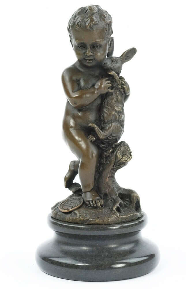 Bronze sculpture of a young boy holding a rabbit, mounted on a round marble base, 15 cm tall.