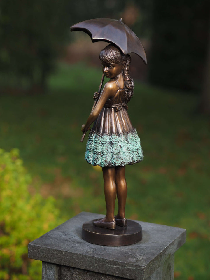 Bronze sculpture of a young girl with an umbrella, elegantly dressed, ideal for indoor or outdoor display.