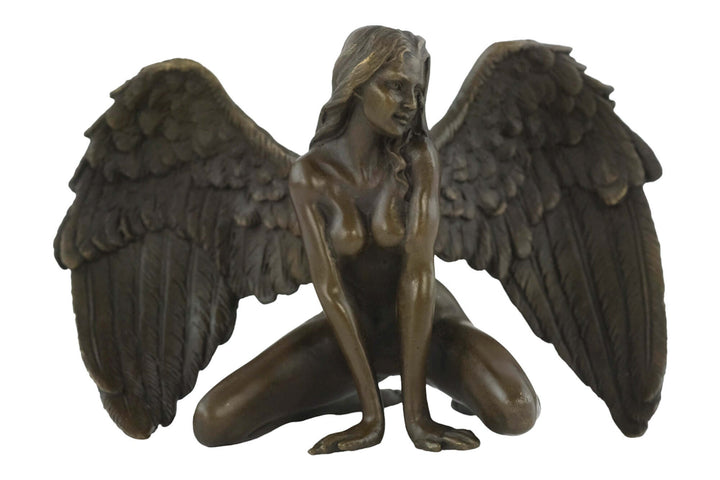Bronze sculpture of a winged female nude leaning forward on hands, intricately detailed with a warm patina.