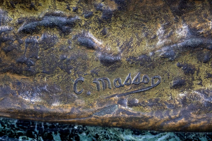 Signature of French sculptor Charles Masson on the antique bronze sculpture of fighting stags.