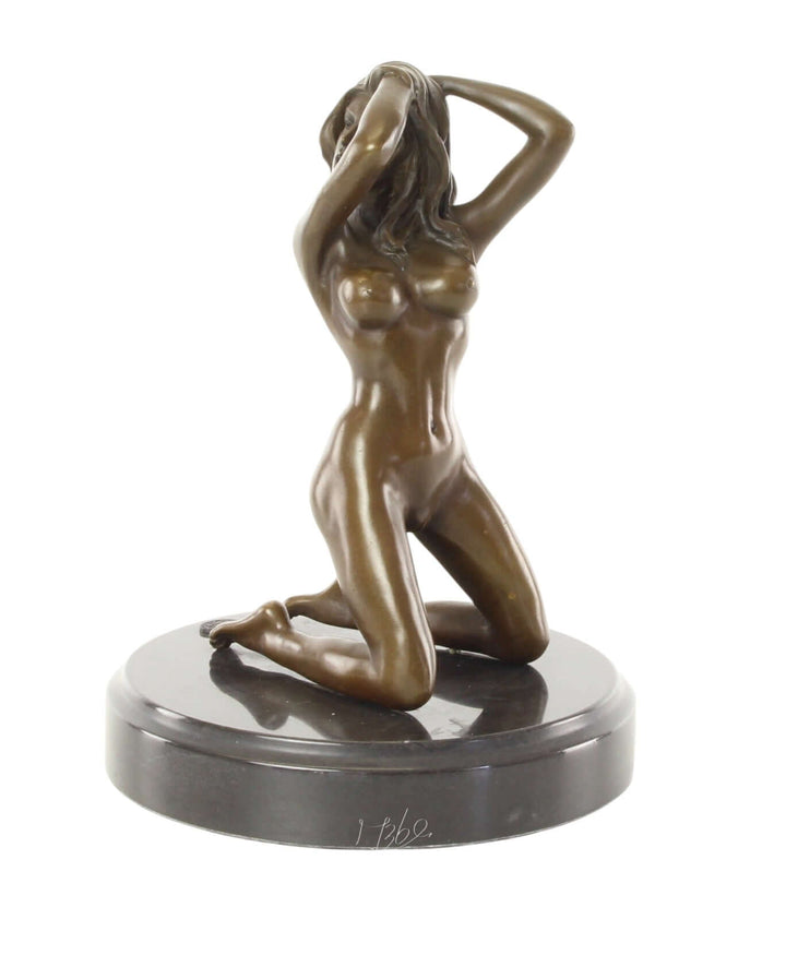 Erotic bronze sculpture of a nude woman kneeling, sensually posing on a round marble base. 21x16 cm size.