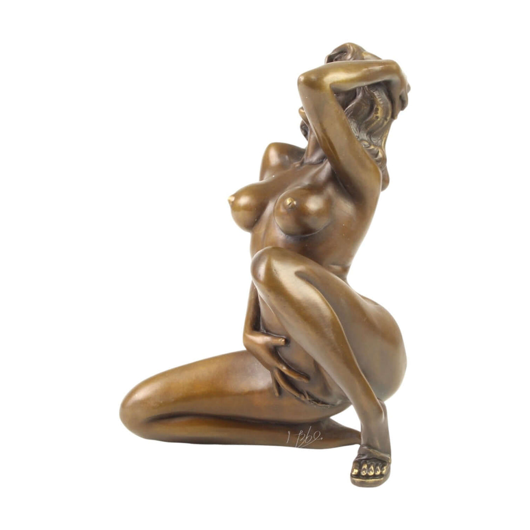 Bronze sculpture of a nude woman in a sensual pose, highlighting curves and self-pleasure, hand-finished with warm patina.