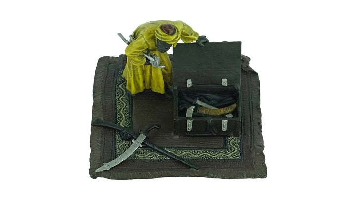 Cold Painted Bronze Sculpture of an Arabian Male on a Rug with Weapon Chest in Vienna Bronze Style Franz Bergman Bronzes Art Nouveau Statue