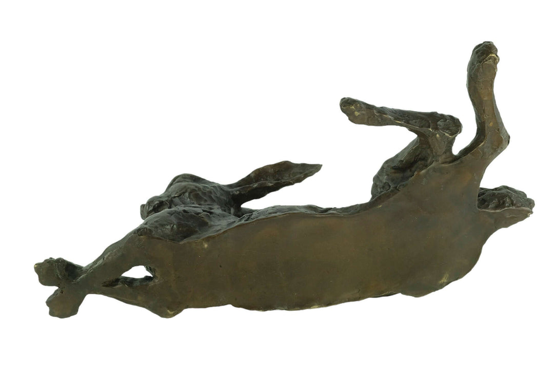 Large bronze reclining hare sculpture with detailed design and warm patina, perfect for home decor.
