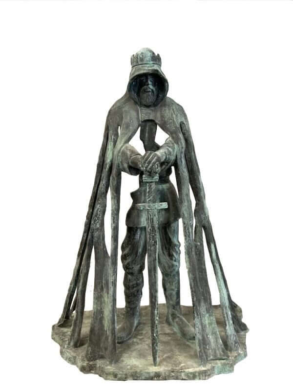 Lifesize bronze sculpture of King Arthur with sword, inspired by Rubin Eynon's Gallos at Tintagel Castle.