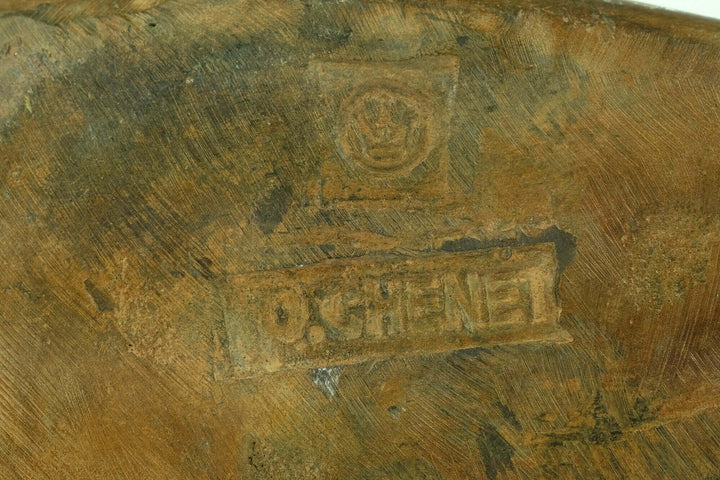 Signature and foundry stamp of bronze female sculpture by Pierre Chenet, showcasing authenticity and craftsmanship.