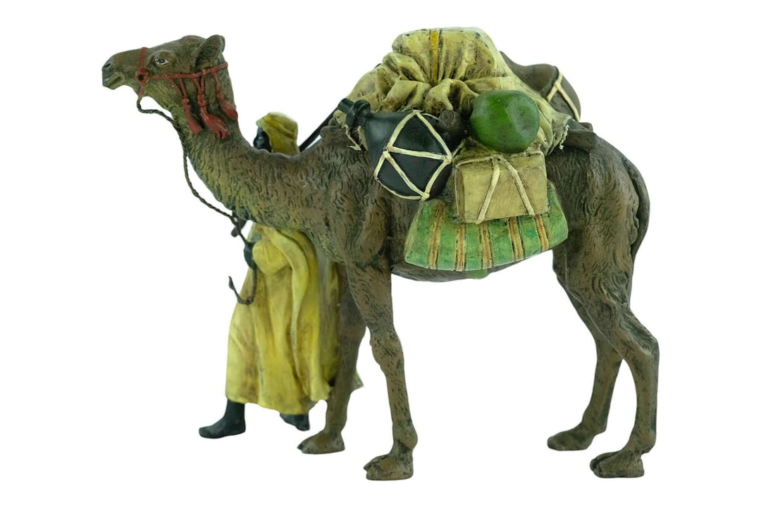 Vienna bronze figurine of a dromedary and soldier, detailed cold painted sculpture in pastel colors.