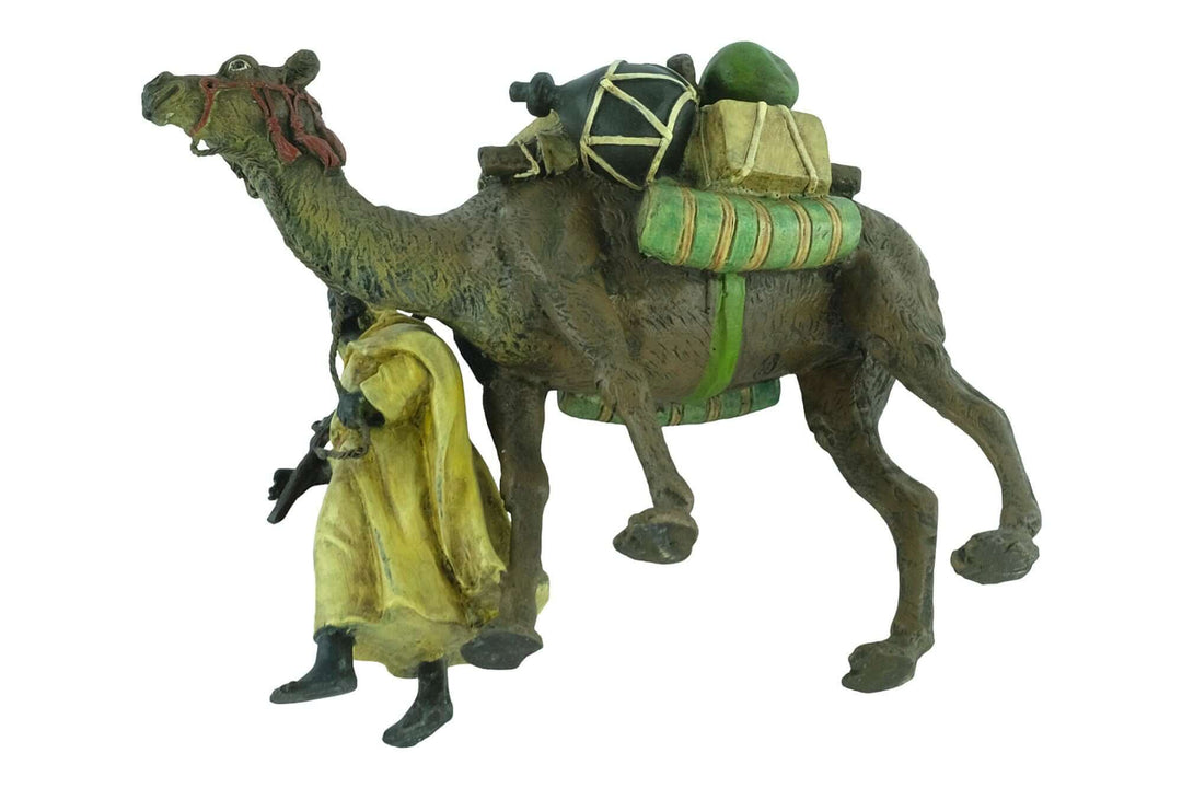 Vienna bronze figurine of a dromedary and soldier, cold painted in pastel colors, detailed craftsmanship, 13x16cm.