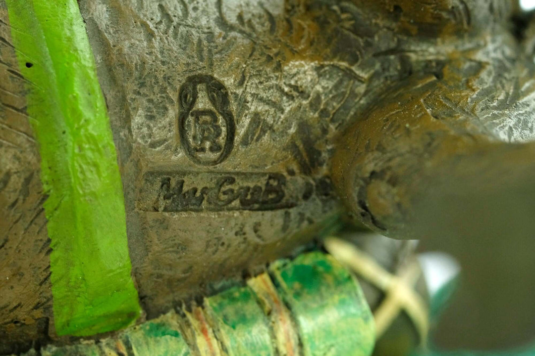 Detail of Vienna Bronze Dromedary figurine showing the signature of Franz Bergman and craftsmanship details.